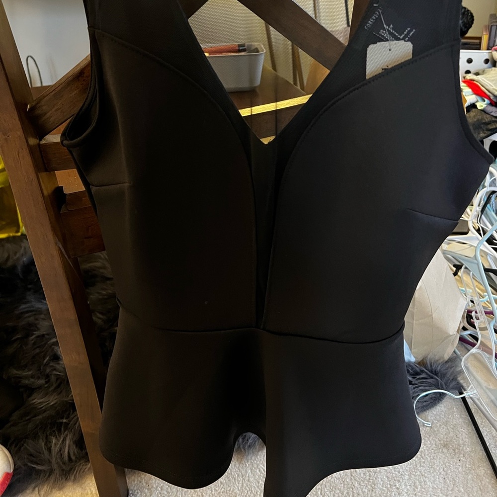 New peplum and sheer top